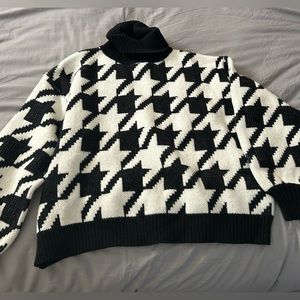 Adika Turtle Neck Sweater